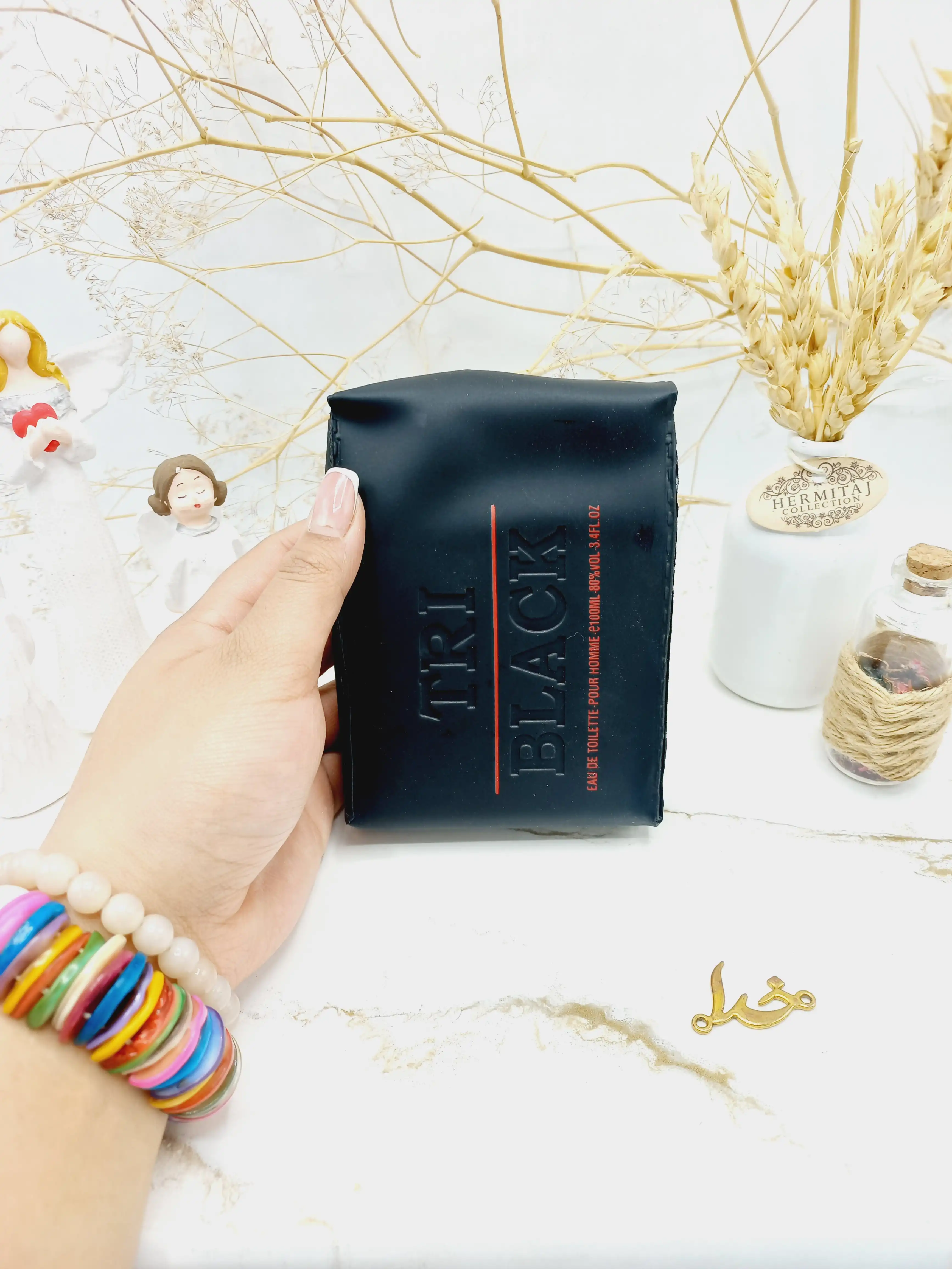 ادکلن تری بلک TRI Black حجم 100 میلی لیتر اماراتی (کیف چرمی)